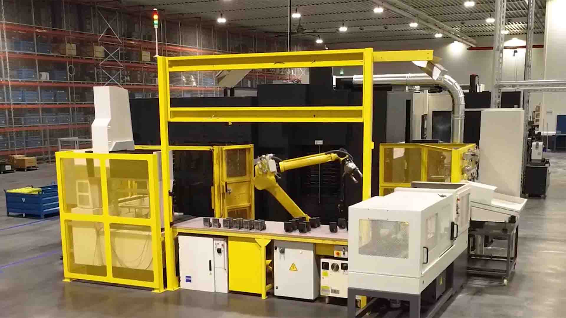 Centro de mecanizado de cinco ejes con robot y sistema de automatización