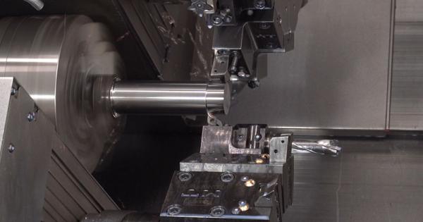 Machining shafts in multiturret lathe using tailstock and Gantry