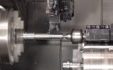 Machining shafts in multiturret lathe using tailstock and Gantry
