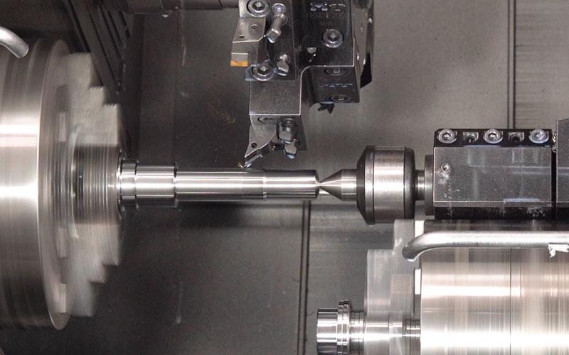 Machining shafts in multiturret lathe using tailstock and Gantry