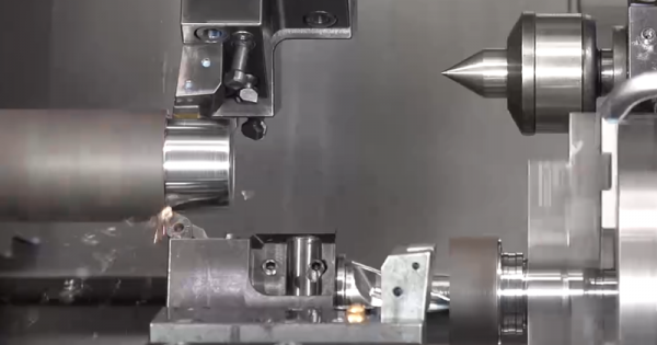 AXLE MACHINING ON A MULTI-TURRET LATHE WITH TAILSTOCK AND GANTRY LOADER 